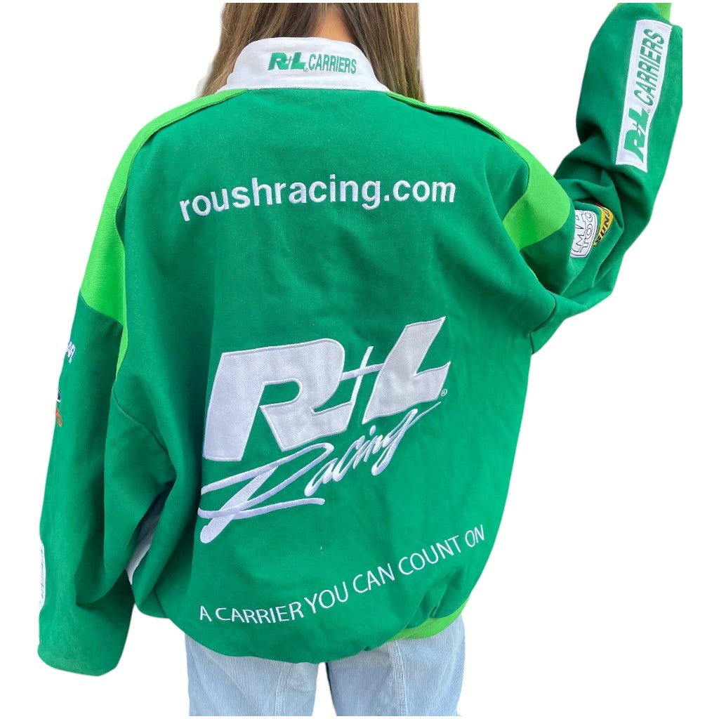 Green racing jacket with visible branding on a white background