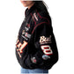 Black racing jacket with various logos and text on a white background