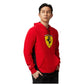 Person wearing a red Ferrari hoodie on a white background