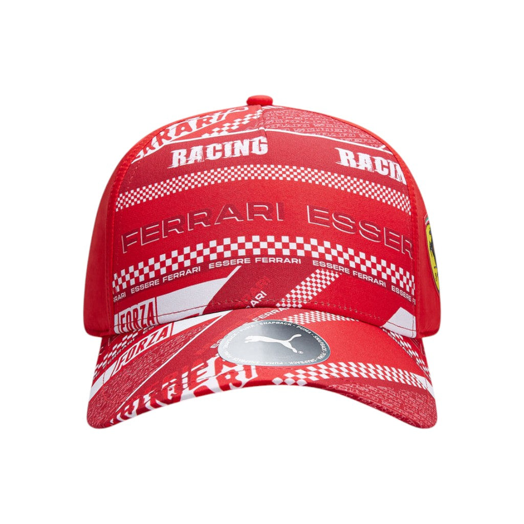 Red Ferrari cap with checkered patterns and branding on a white background