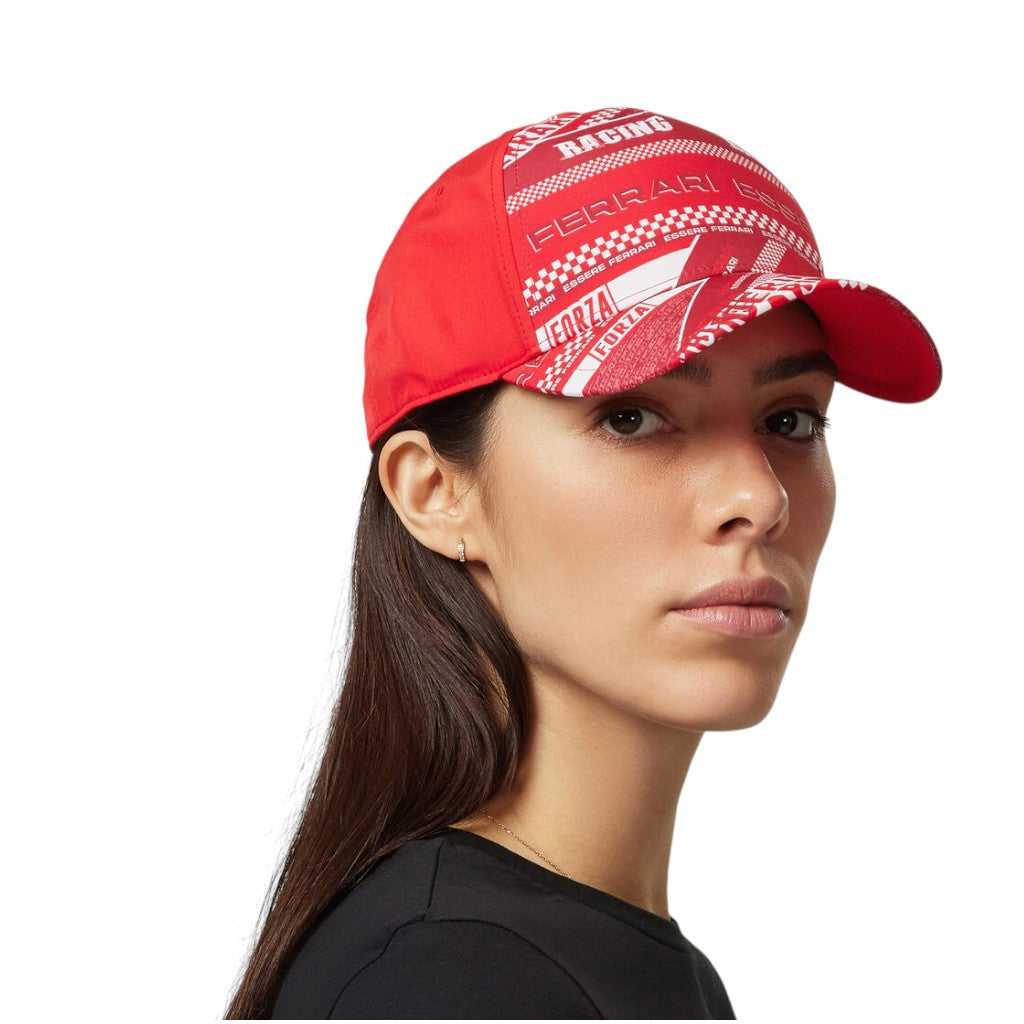 Person wearing a red cap with white patterns on a white background