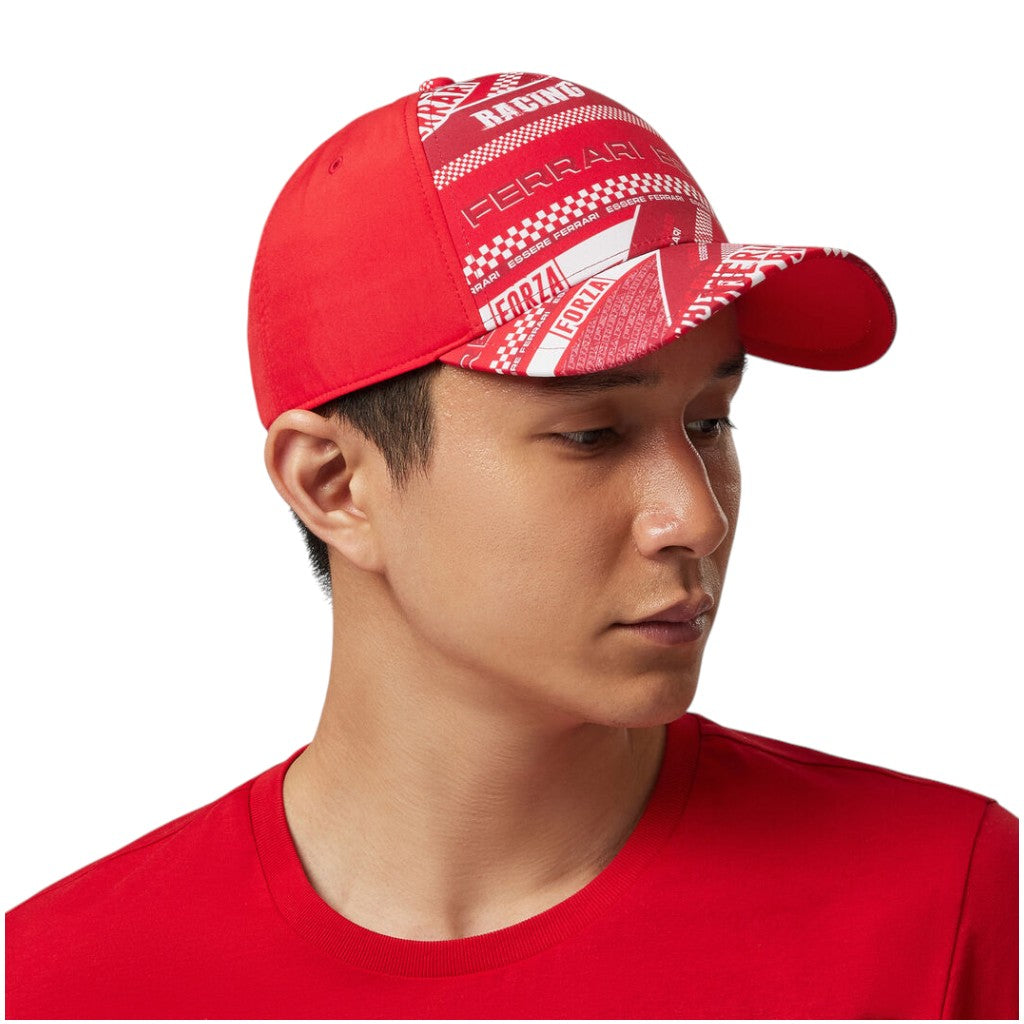 Person wearing a red cap with white patterns on a white background