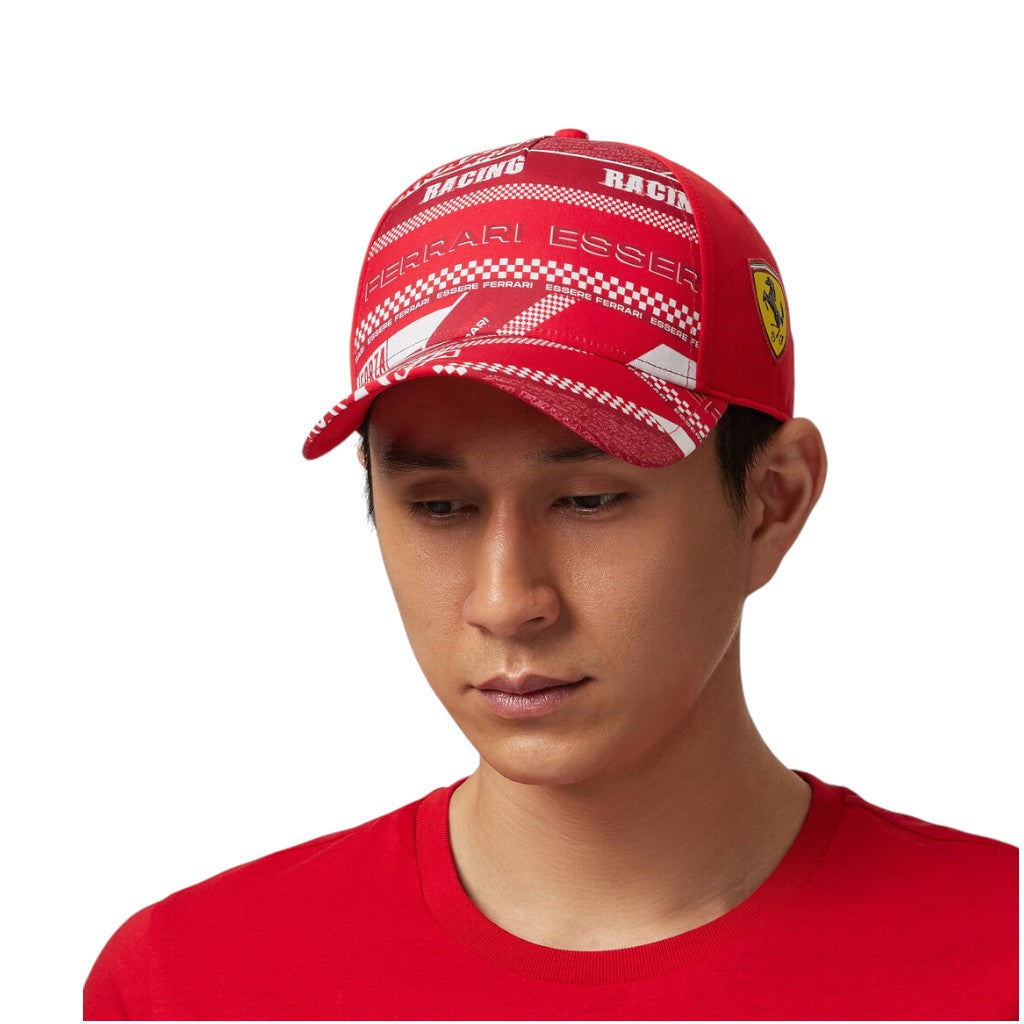 Person wearing a red Ferrari cap with a white logo on a white background