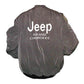 Gray jacket with 'Jeep Grand Cherokee' text on the back against a white background