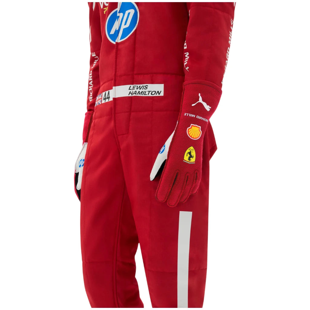 Red racing suit with various logos on a white background