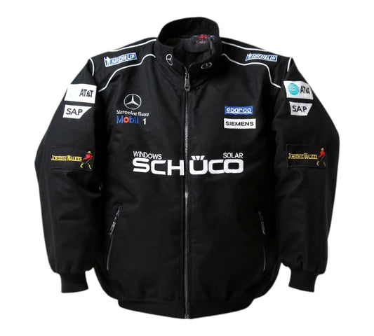 Black jacket with various sponsor logos on a white background