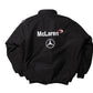 Black jacket with McLaren and Mercedes-Benz logos on a white background