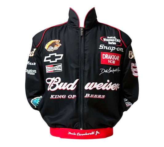 Black jacket with various sponsor logos on a white background