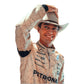 Person wearing a racing suit with sponsor logos, raising one arm in a gesture.