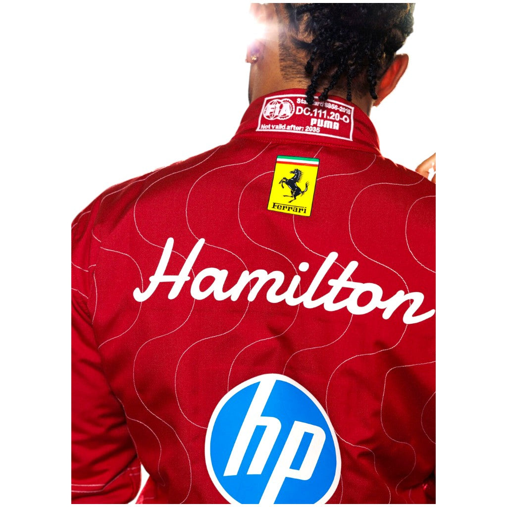 Red racing suit with 'Hamilton' and 'hp' logos on a white background