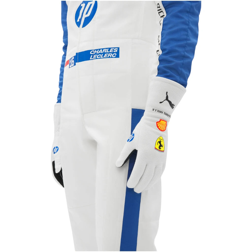 White and blue racing suit with various logos on a white background
