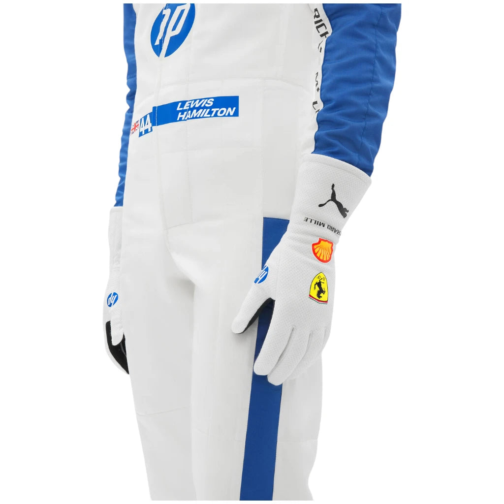 White and blue racing suit with various logos on a white background