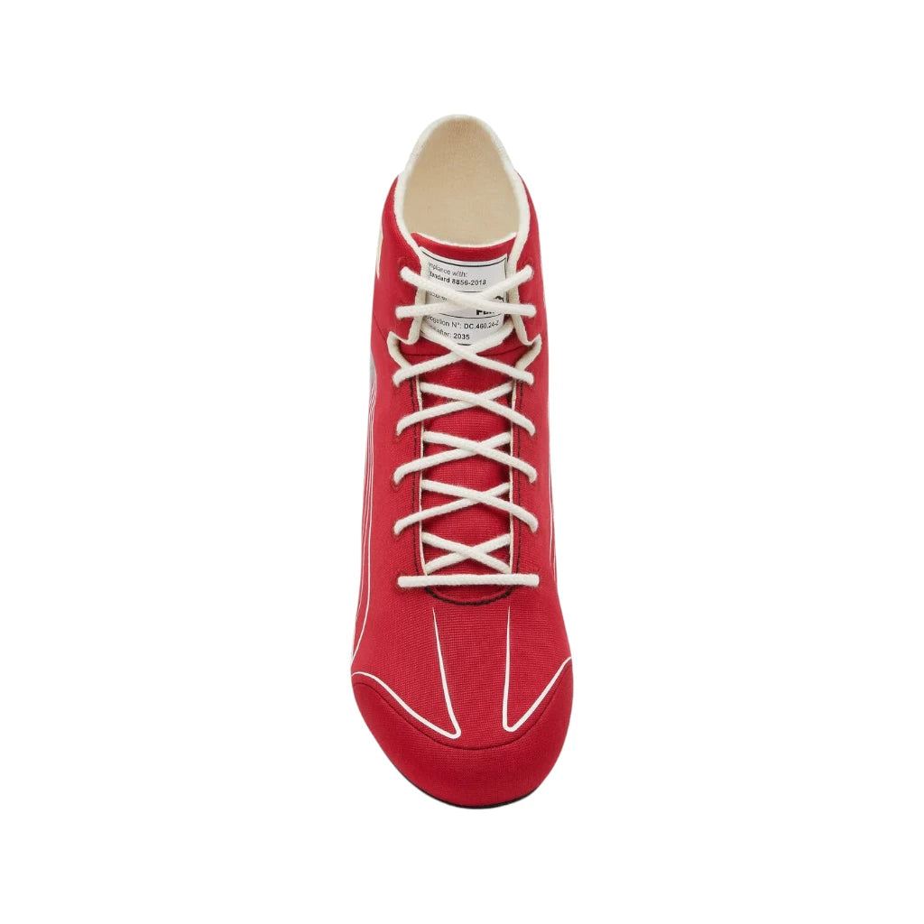 Red high-top sneaker with white laces on a white background