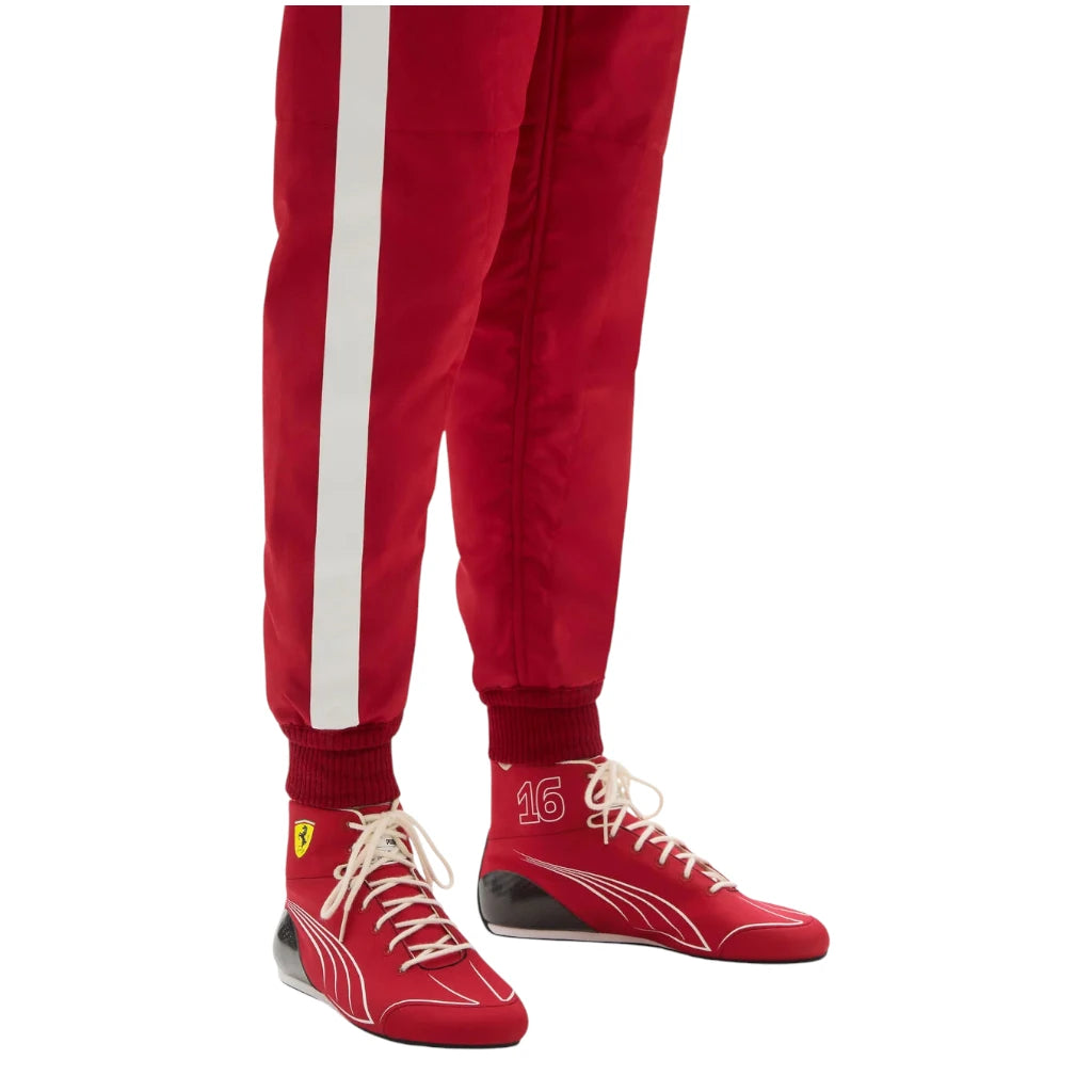 Red tracksuit with white stripes and red shoes on a white background