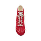 Red sneaker with white laces on a white background