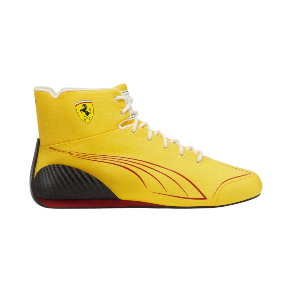 Yellow high-top sneaker with a red and black design on a white background