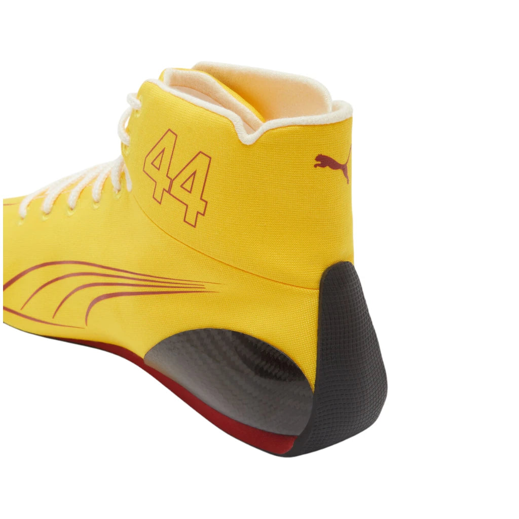 Yellow high-top sneaker with number 44 and Puma logo on a white background