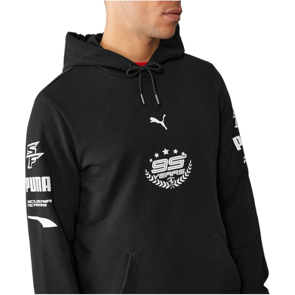 Black hoodie with Puma branding and logos on a white background