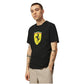 Person wearing a black t-shirt with a colorful logo on a white background
