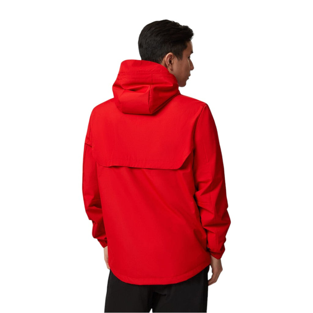 Person wearing a red jacket on a white background