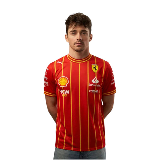 Person wearing a red sports jersey with various sponsor logos on a white background