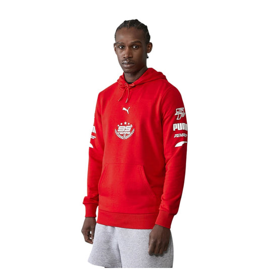 Person wearing a red Puma hoodie on a white background