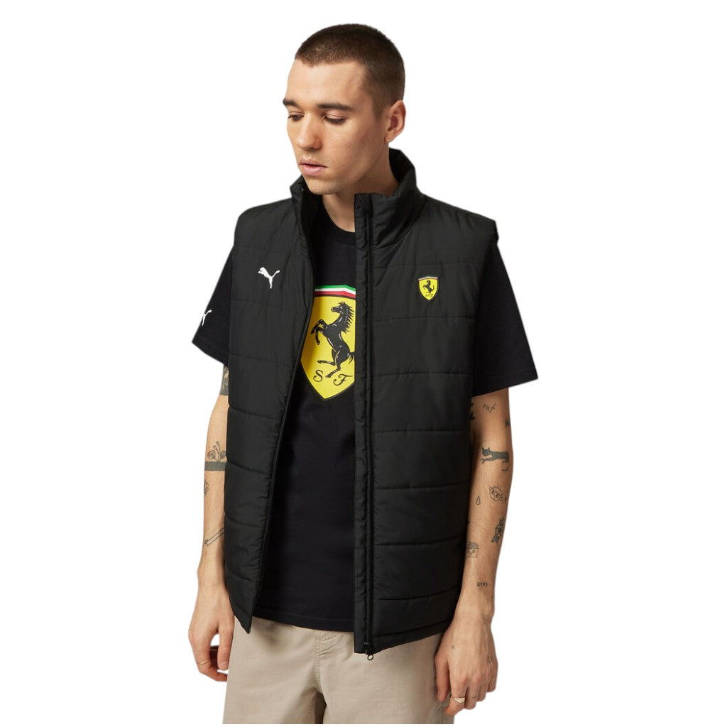 Person wearing a black vest with Ferrari logo and Puma branding on a white background