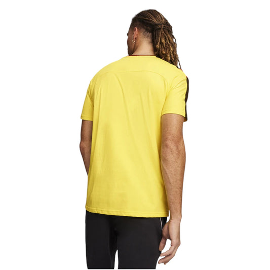 Person wearing a yellow t-shirt on a white background