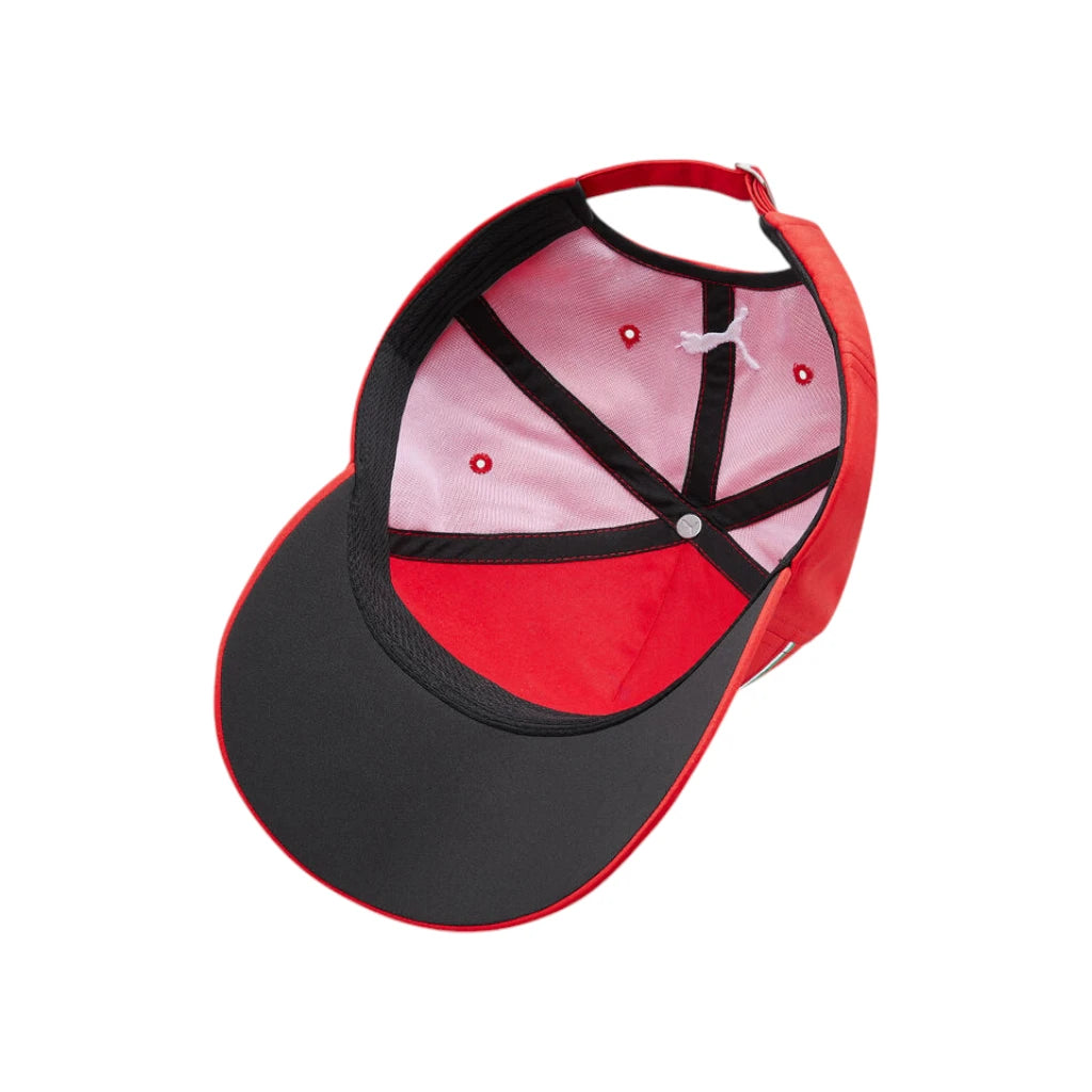 Red and black cap with a pink interior on a white background