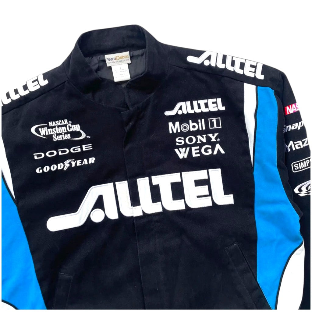 Black racing suit with various sponsor logos on a white background