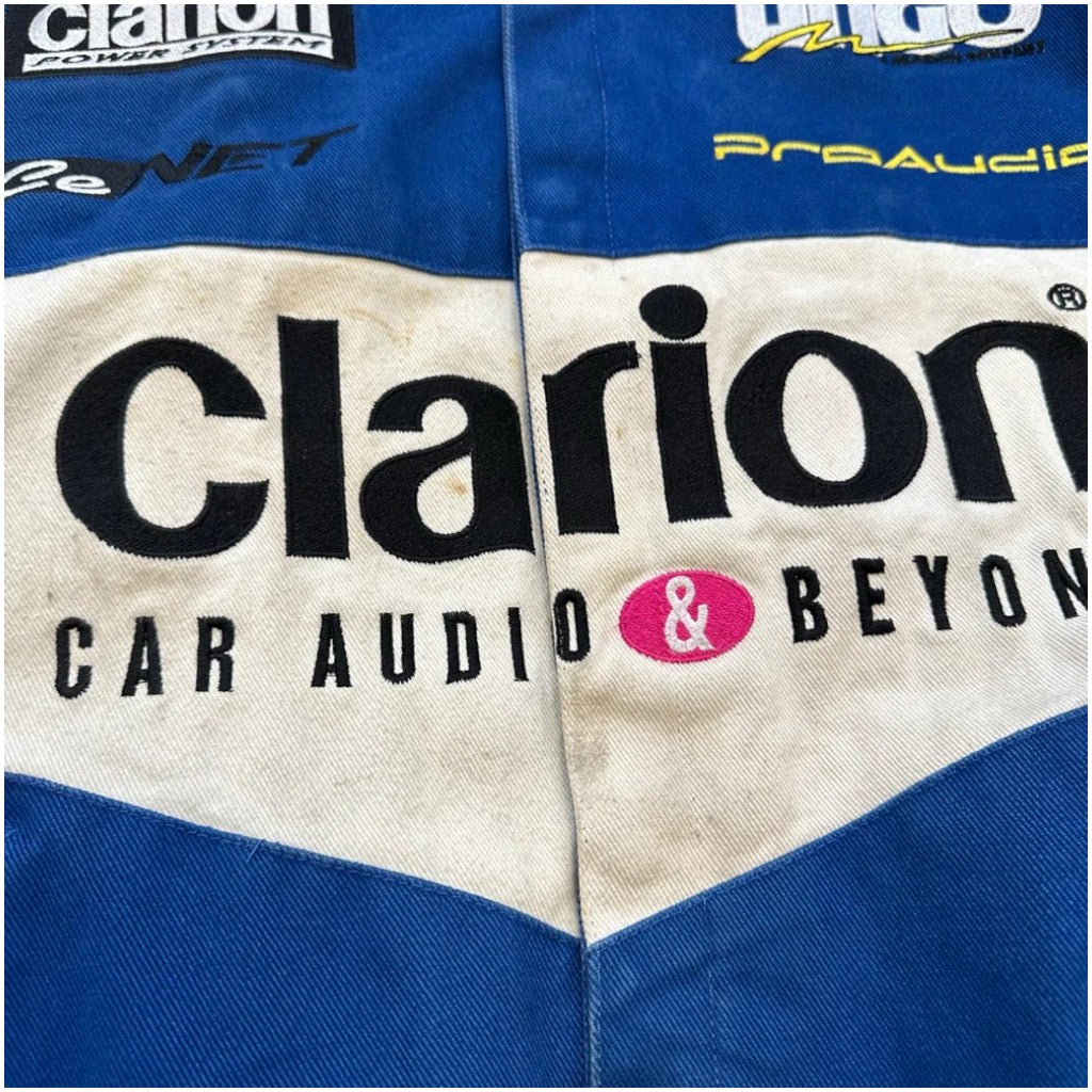 Close-up of a sports jersey with 'Clarion Car Audio & Beyond' branding.