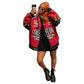 Person wearing a red and black jacket with branding, taking a selfie on a white background
