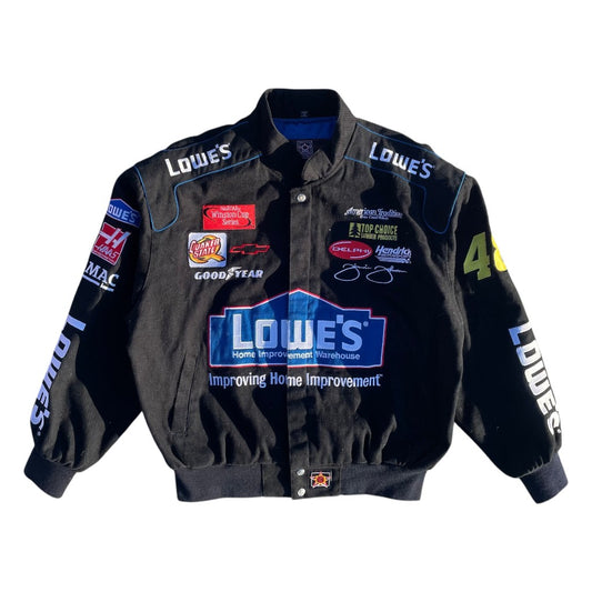 Black jacket with various logos and branding on a white background