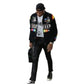 Person wearing a black jacket with various logos on a white background