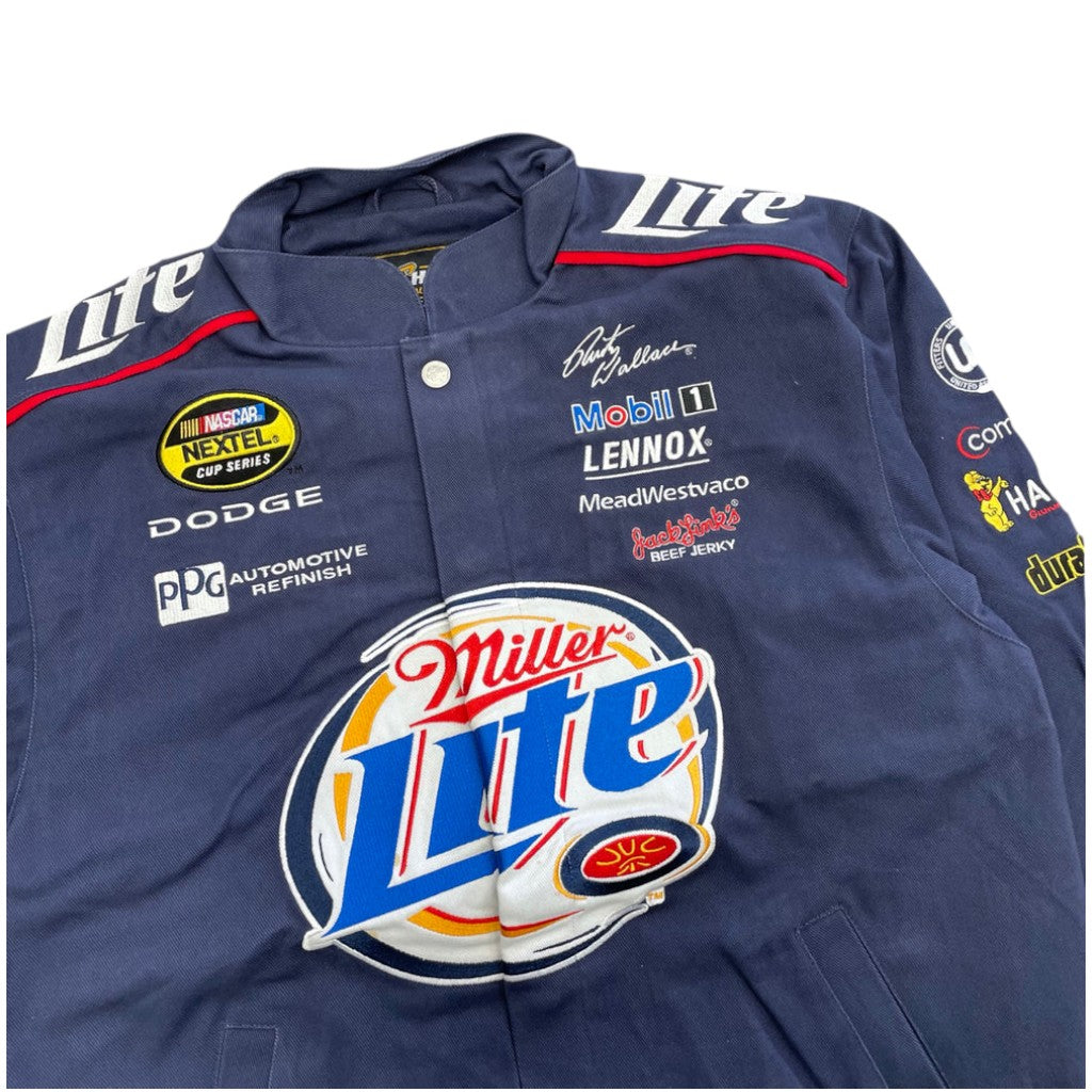Navy blue jacket with multiple brand logos on a white background