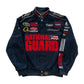 Navy blue jacket with various logos and 'National Guard' text on a white background