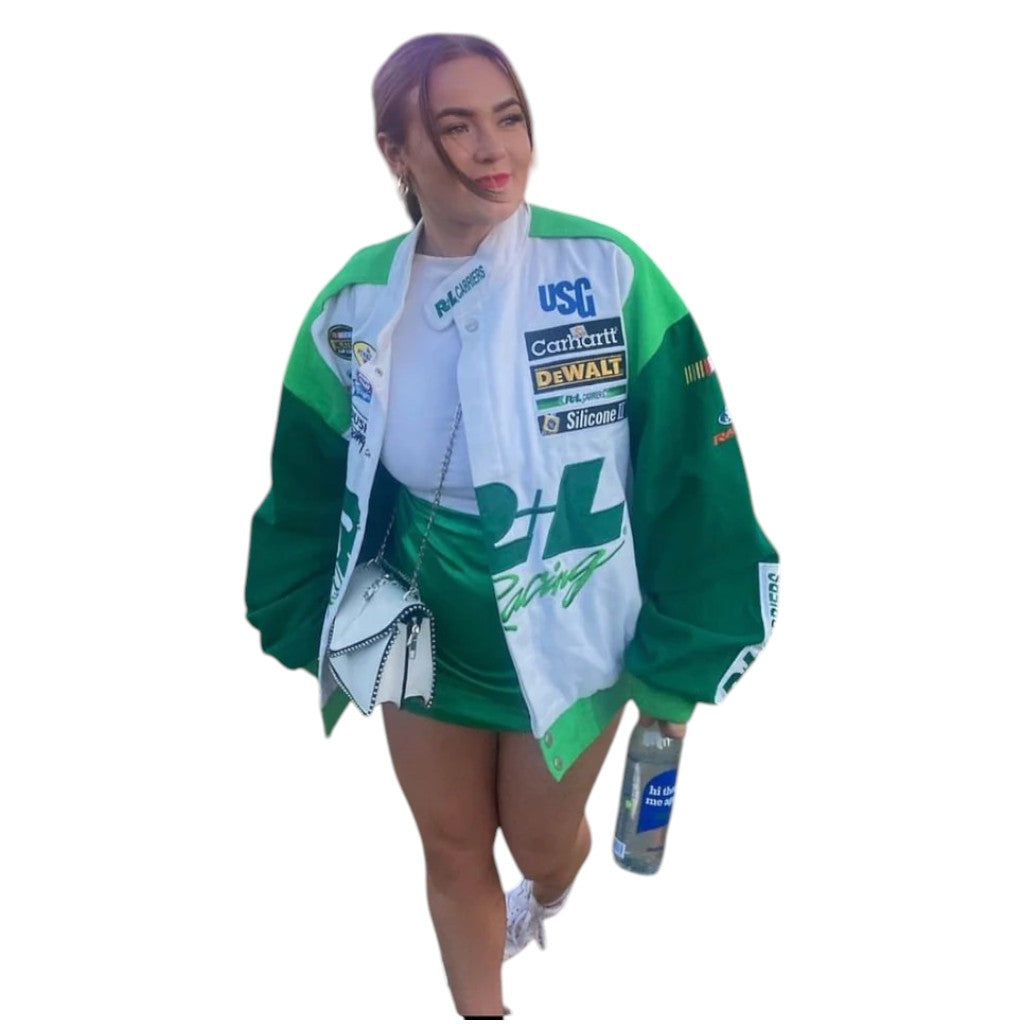Person wearing a green and white jacket with various logos on a white background