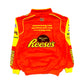 Orange racing suit with yellow accents and Reese's branding on a white background