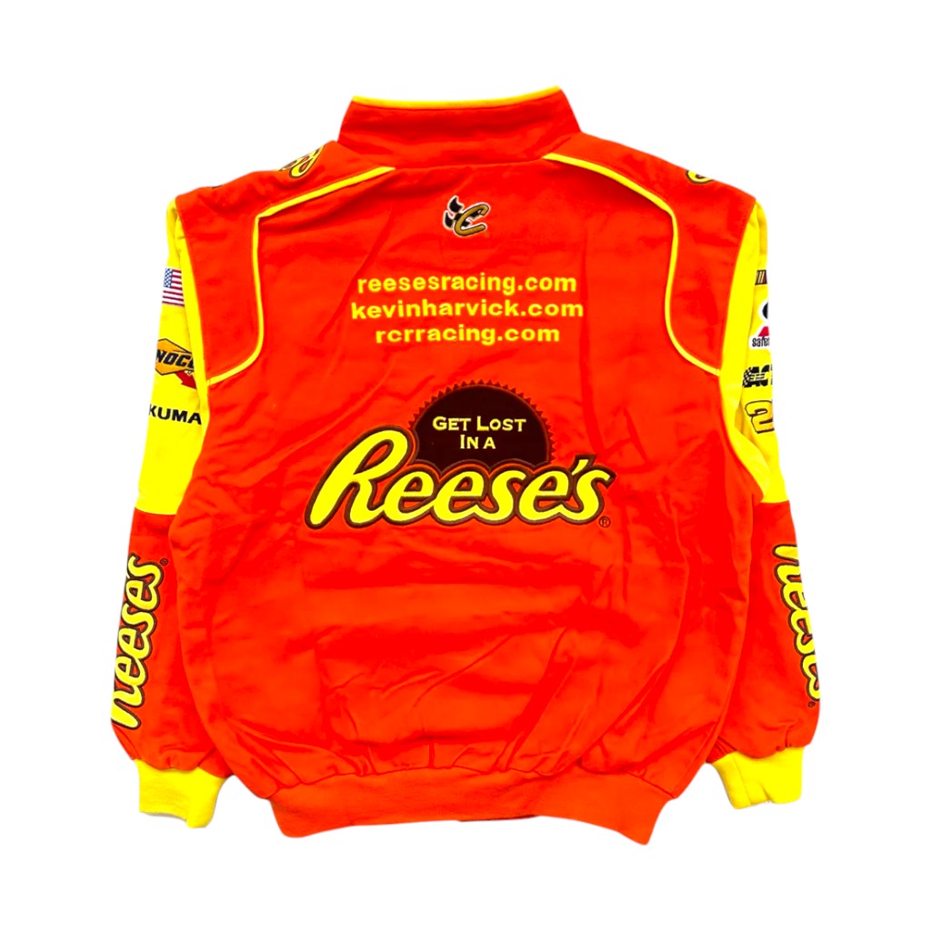 Orange racing suit with yellow accents and Reese's branding on a white background