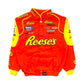 Orange racing jacket with yellow accents and multiple sponsor logos on a white background