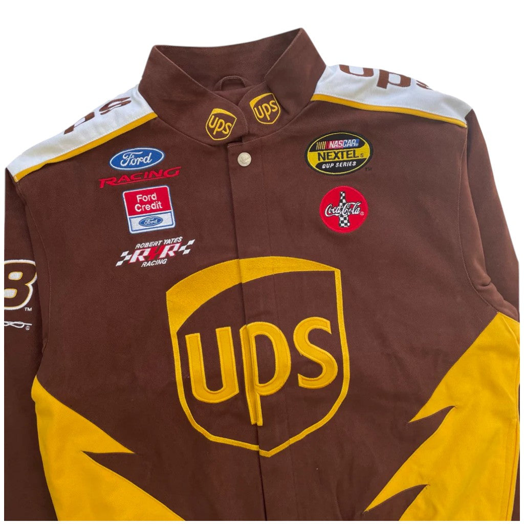 Brown and yellow racing jacket with various logos including UPS, Ford, and Coca-Cola on a white background.